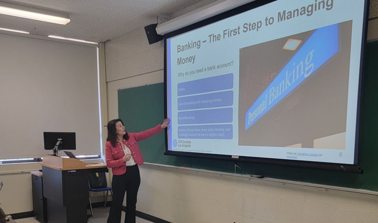 CFA Society Los Angeles volunteer presenting financial literacy education to students