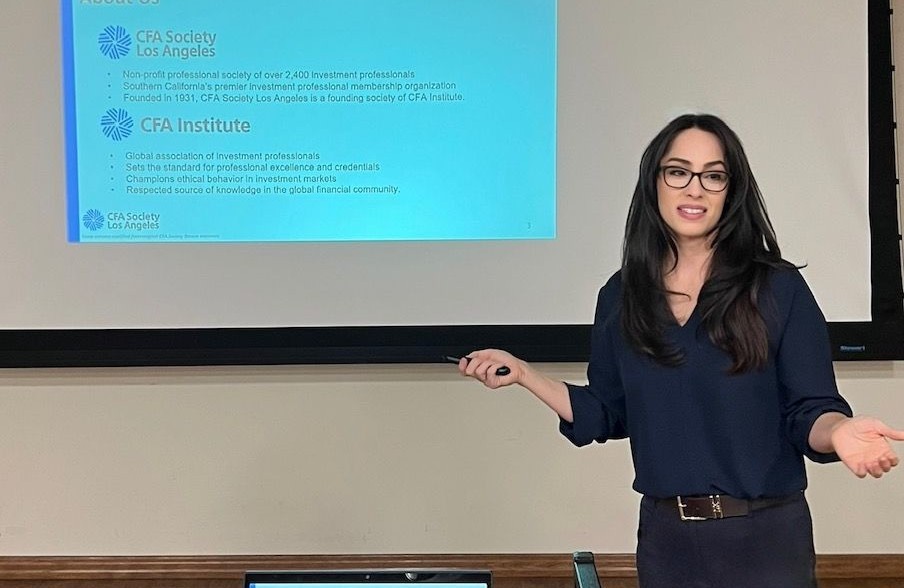 CFA Society Los Angeles volunteer presenting financial literacy educational materials