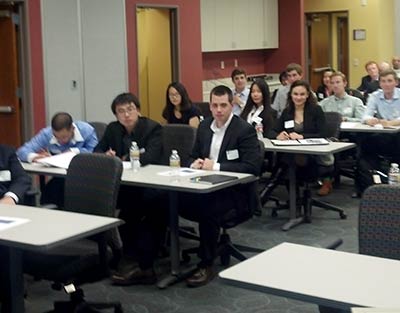 Students listen to Jacobs Engineering presentation.