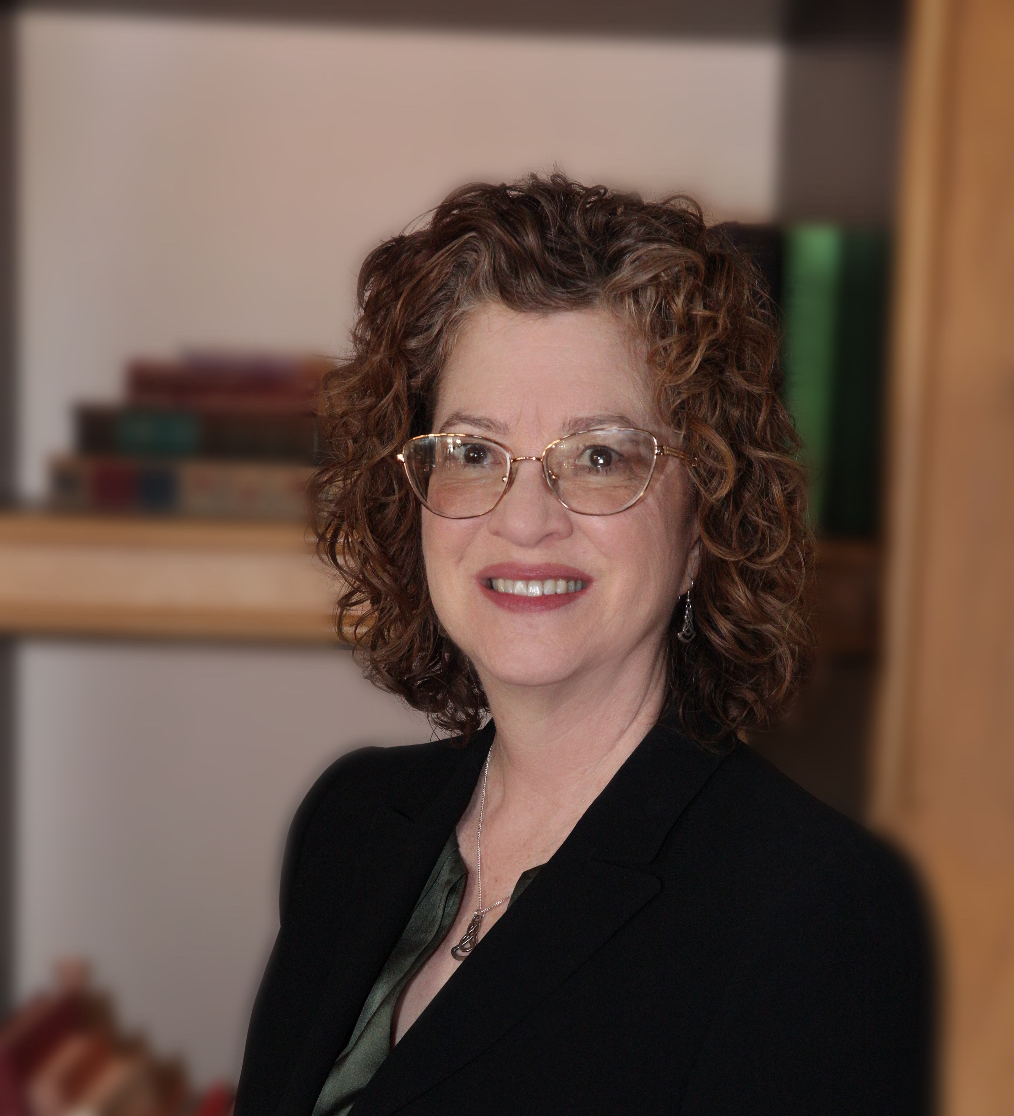 Alicia Romo, CFA,  Past President, CFA Society Los Angeles